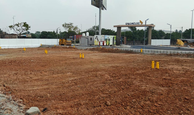 An image of Plot Boundary Stone & Levelling Completed showing construction status of DRA Secura residential Properties in Soranjeri, Chennai as on 05th February 2026