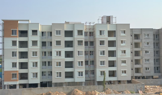 An image of North Side View. showing construction status of DRA Trinity residential Flats in Thoraipakkam, Chennai as on 07th May 2026