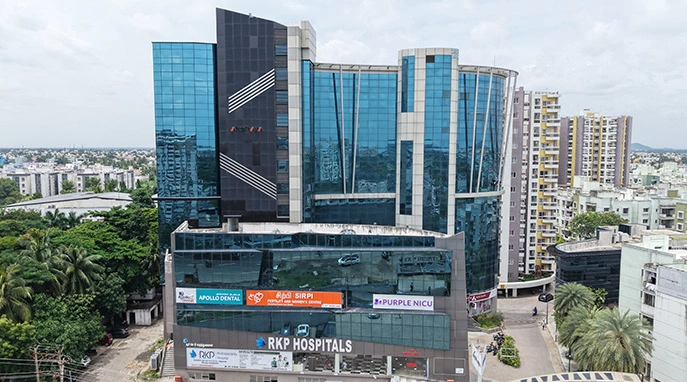 DRA Cove modern properties complex with sleek towers and landscaped surroundings.